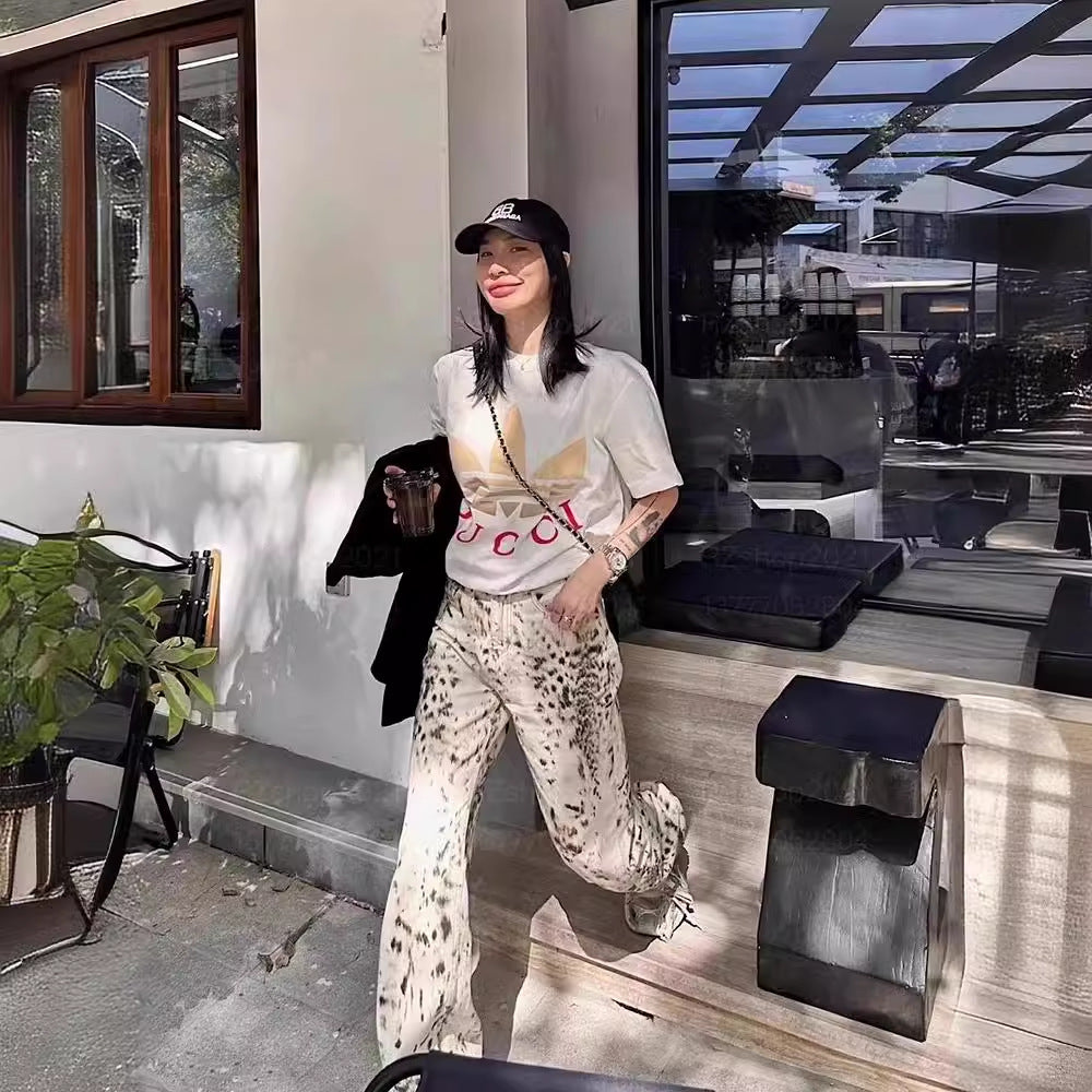 HIGH-WAIST PRINTED WIDE-LEG TROUSERS